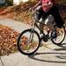 A bicycler rides on the sidewalk of Main Street on Tuesday. Daniel Brenner I AnnArbor.com